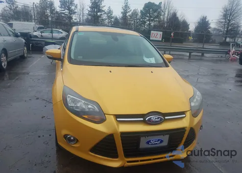 2012 Ford Focus Titanium z USA, uszkodzony, nr VIN 1FAHP3J26CL345722